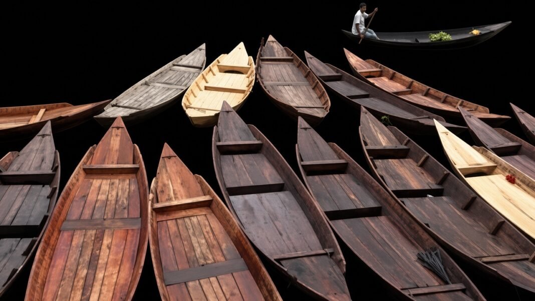Floating Boat Market in Pirojpur Keeps a Century-Old Tradition Alive Floating Boat Market in Pirojpur with traditional wooden boats Image Title: Floating Boat Market in Pirojpur